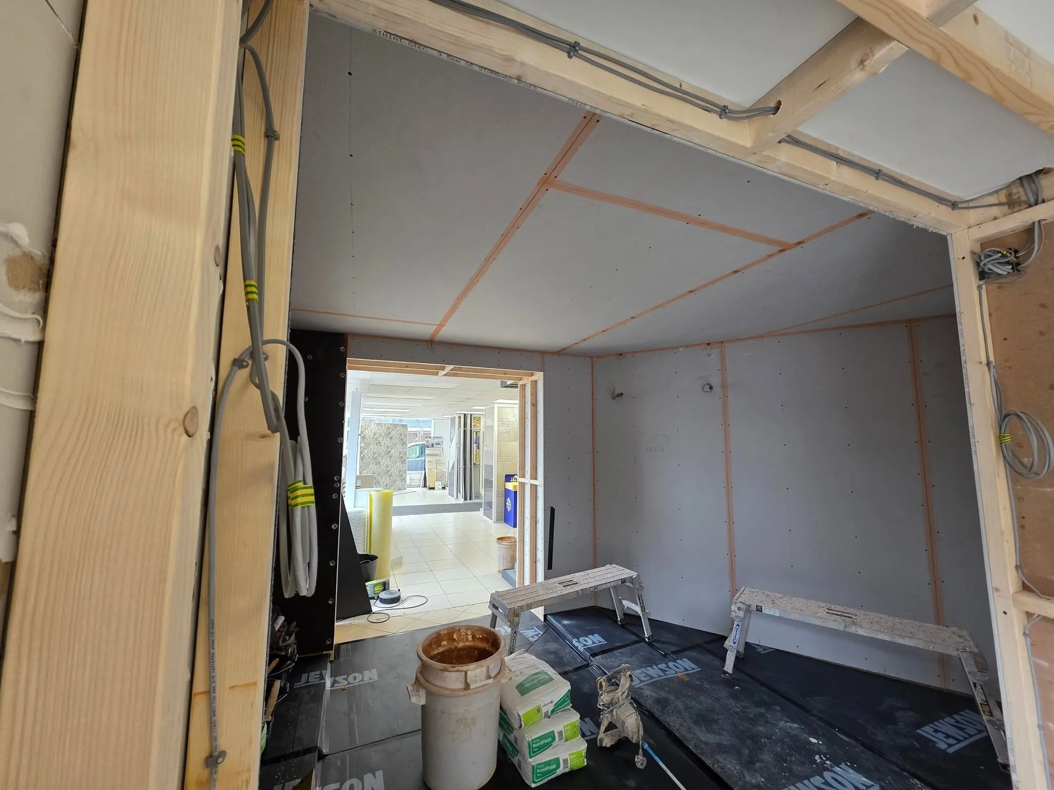 A room battened out and boarded, ready to be plastered.